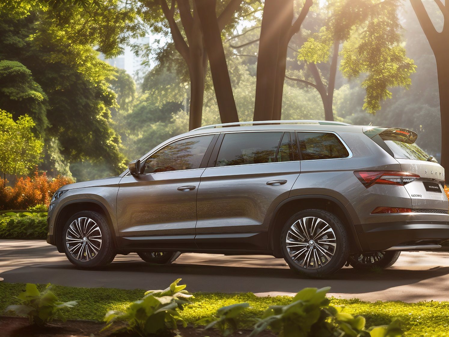 Skoda Kodiaq parked on a leafy street with sunlight filtering through tall trees. The car has a sleek and modern design. In the background, a garden with vibrant flowers is visible.