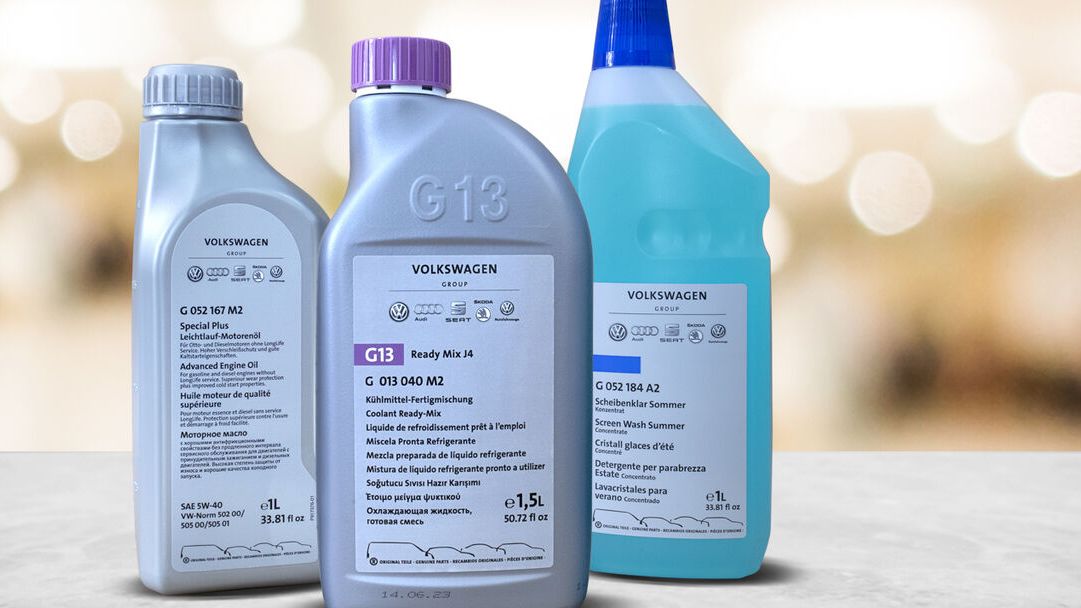 Three bottles of the Ready-to-go package solution on a grey top with warm coloured bokeh background